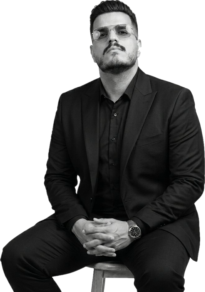 Hussein Eldreny, SEO Team Leader, seated portrait